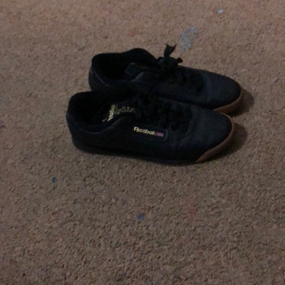 Black and gold Reebok